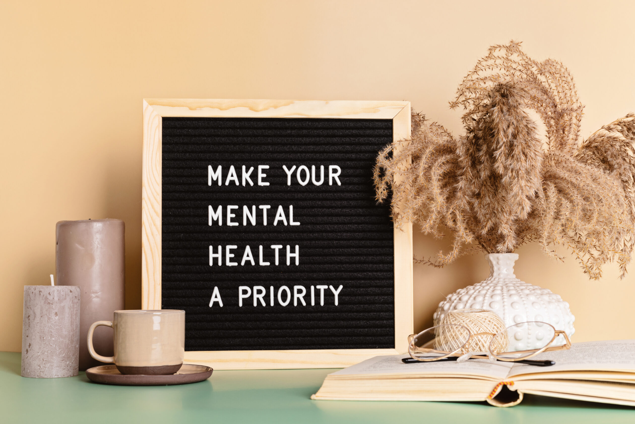 make your mental health a priority motivational quote on the letter board. inspiration psycological text